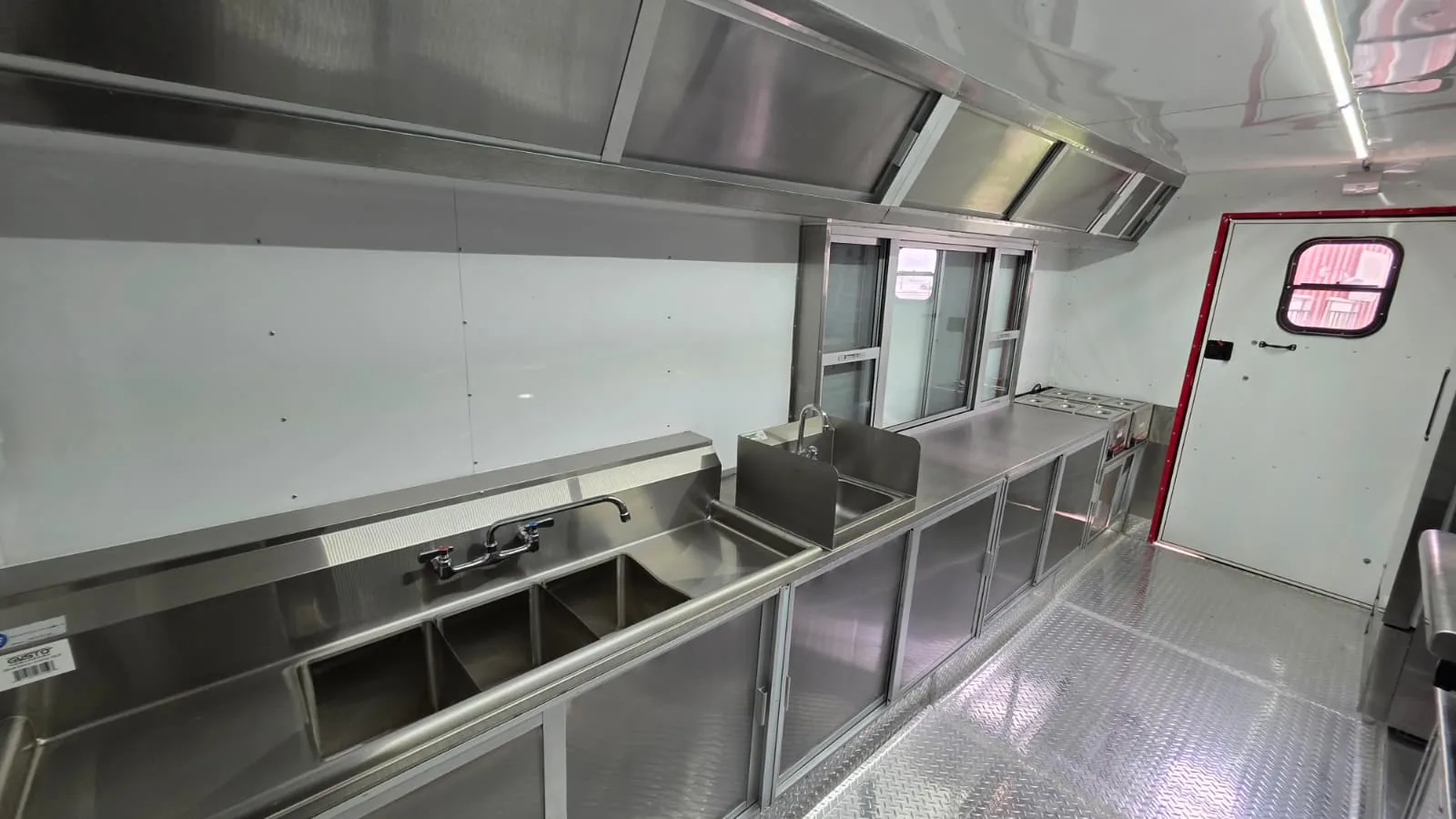 Carranza trailer interior with a stainless-steel sink and service-counter line