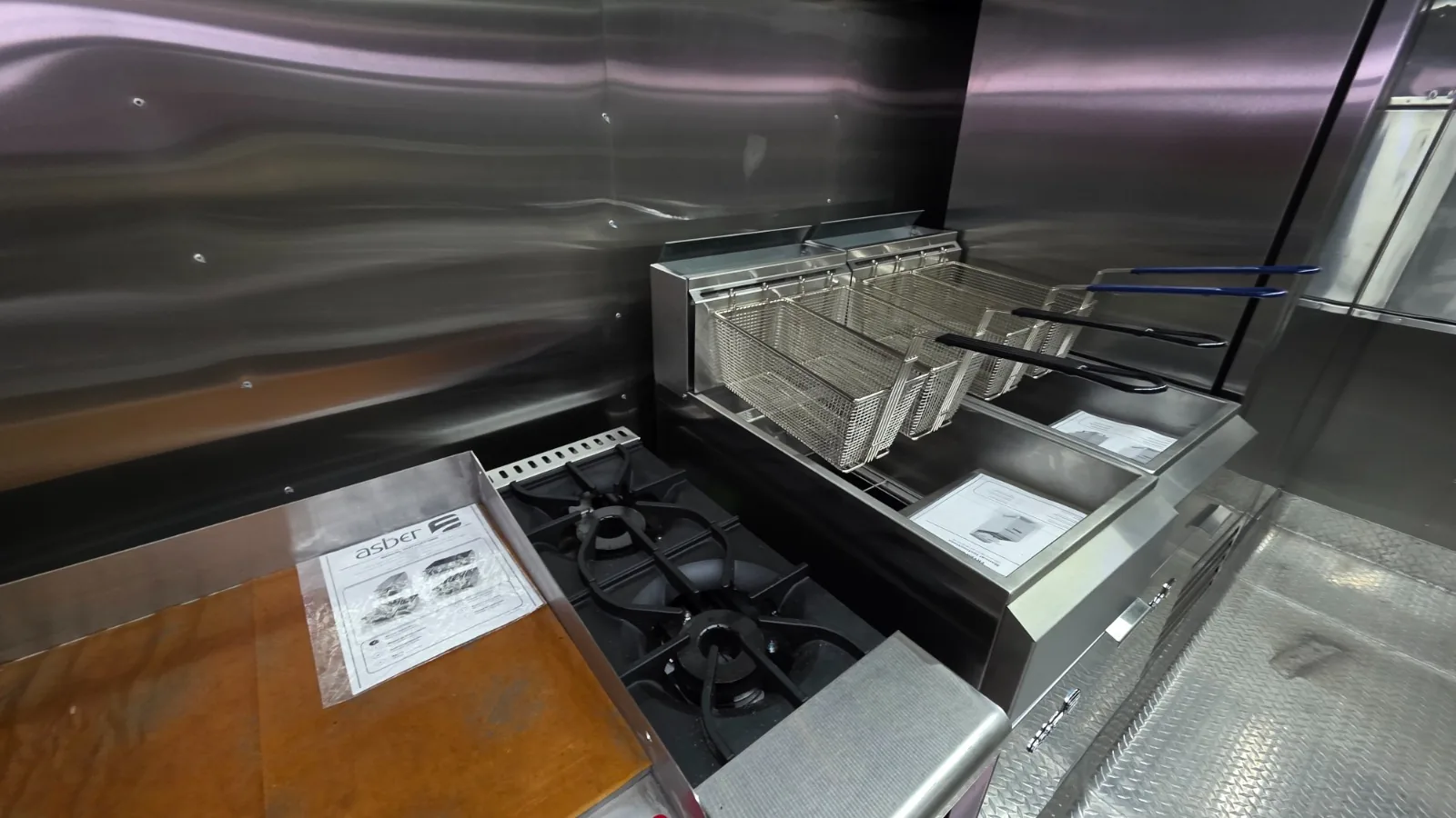 Carranza trailer cooking equipment with range and commercial fryers